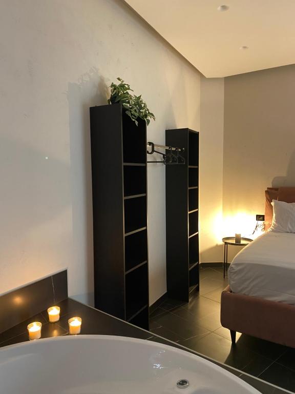 Postel nebo postele na pokoji v ubytování Le Colonne B&b