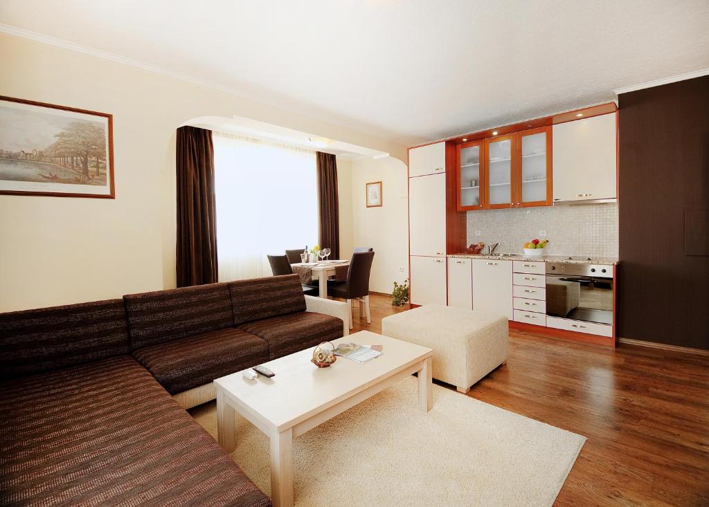 Kuchyň nebo kuchyňský kout v ubytování Apartments Carrera