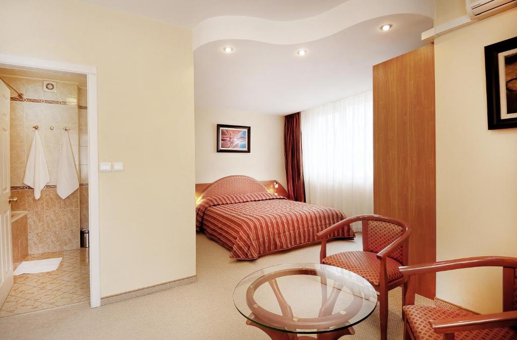 Postel nebo postele na pokoji v ubytování Apartments Carrera