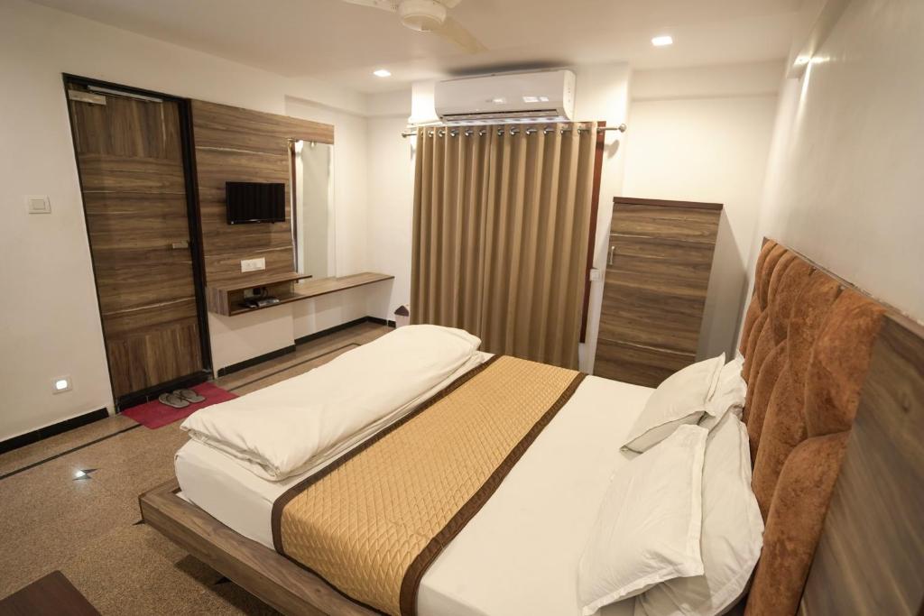 Postel nebo postele na pokoji v ubytování Hotel Shertown