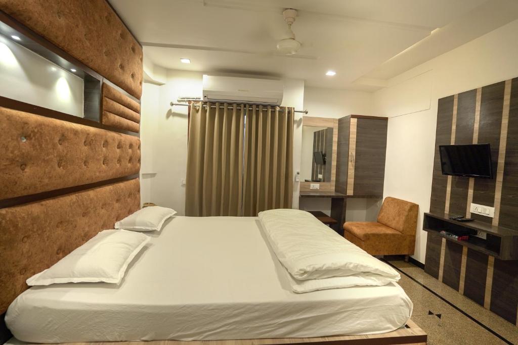 Postel nebo postele na pokoji v ubytování Hotel Shertown