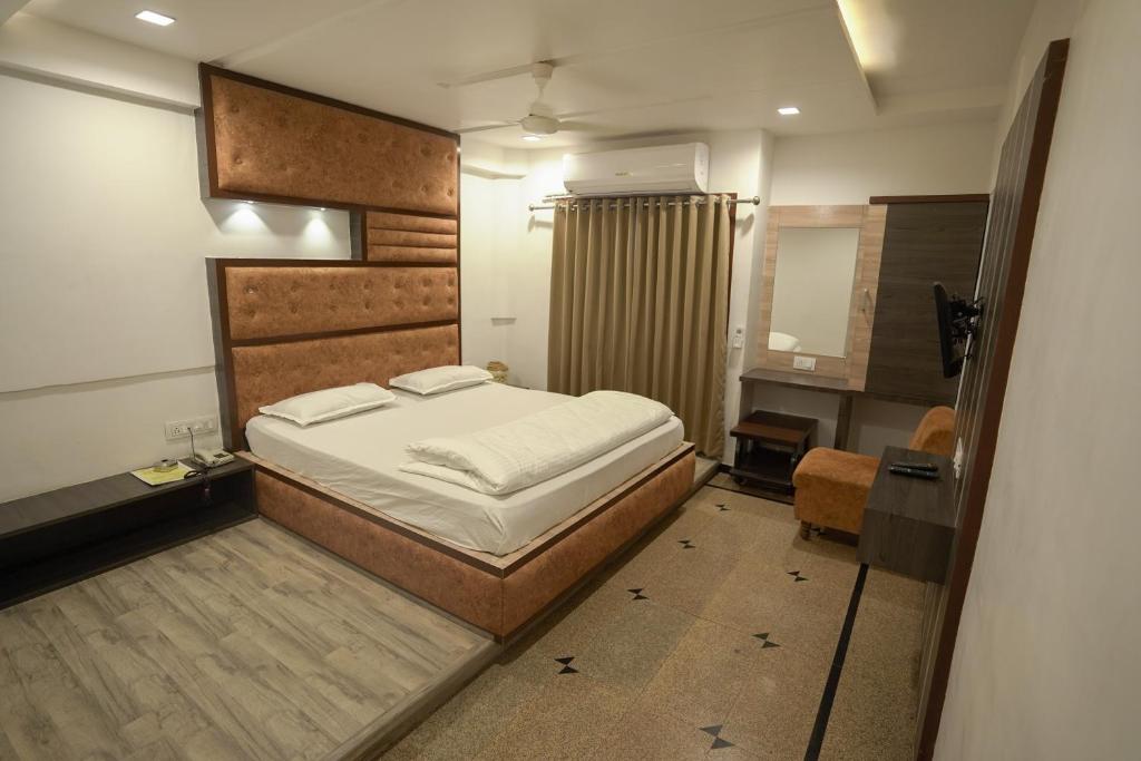 Postel nebo postele na pokoji v ubytování Hotel Shertown
