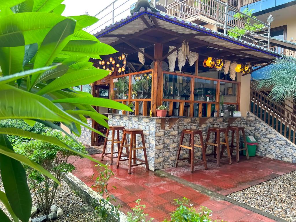 Balkón nebo terasa v ubytování Ama Garden Sauraha