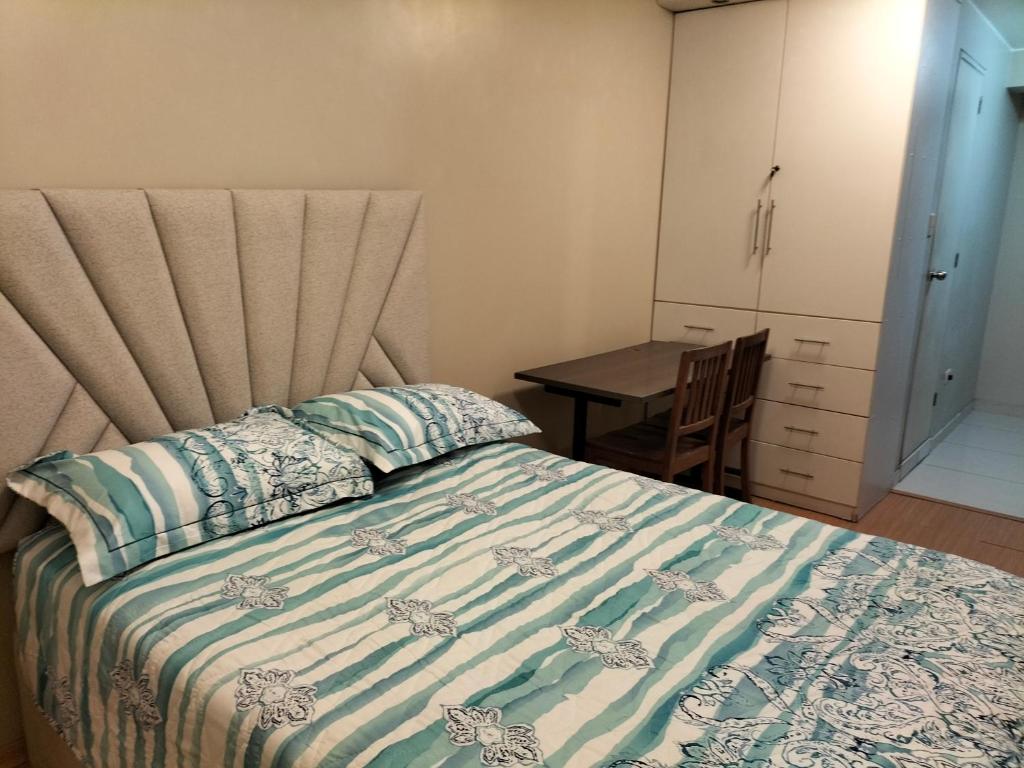 En eller flere senge i et værelse på Lugar cómodo y seguro
