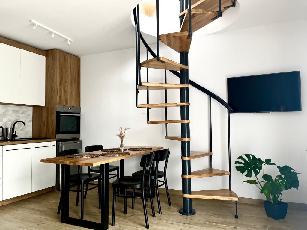 Kuchyňa alebo kuchynka v ubytovaní Apartamenty Lobeliowy Port