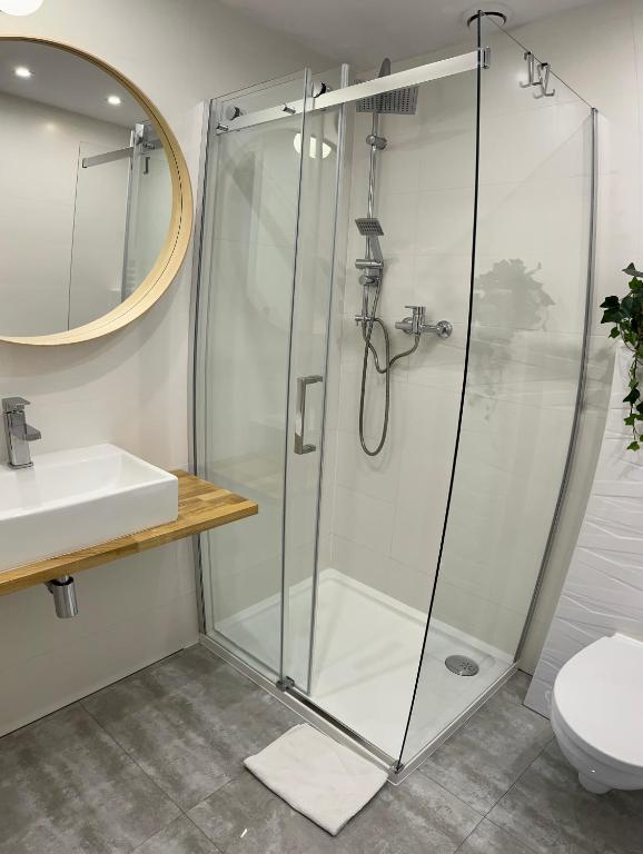 Kúpeľňa v ubytovaní Apartamenty Lobeliowy Port