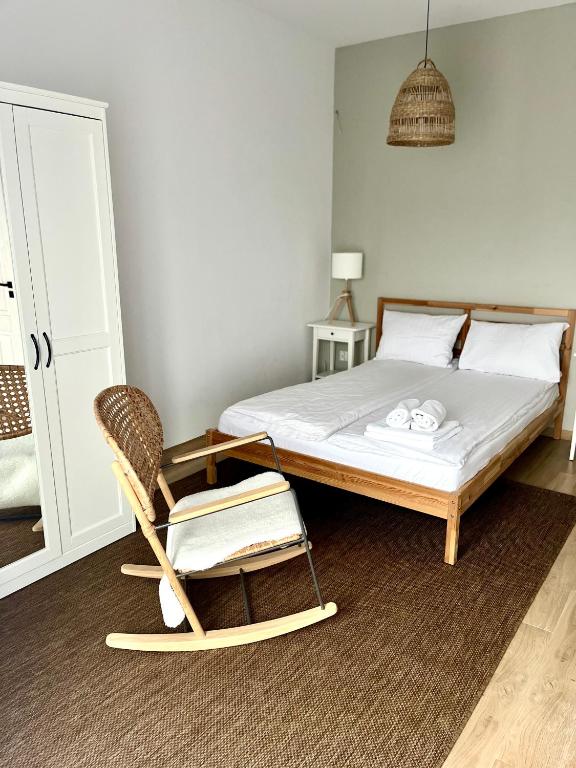 Posteľ alebo postele v izbe v ubytovaní Apartamenty Lobeliowy Port