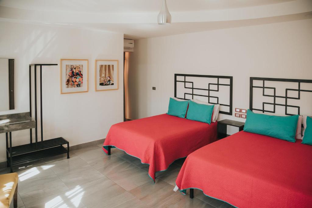 Postel nebo postele na pokoji v ubytování MCI HOTEL