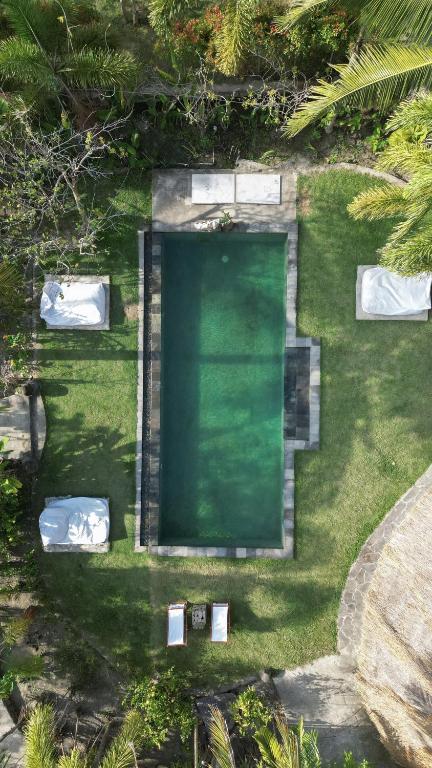 Bazén v ubytování Tiki Boutique Hotel Spa Lombok nebo v jeho okolí