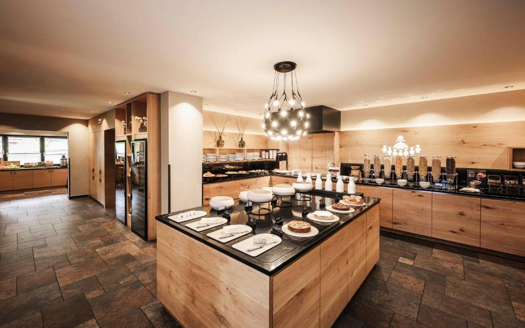 Kuchyň nebo kuchyňský kout v ubytování Biancaneve Family Hotel