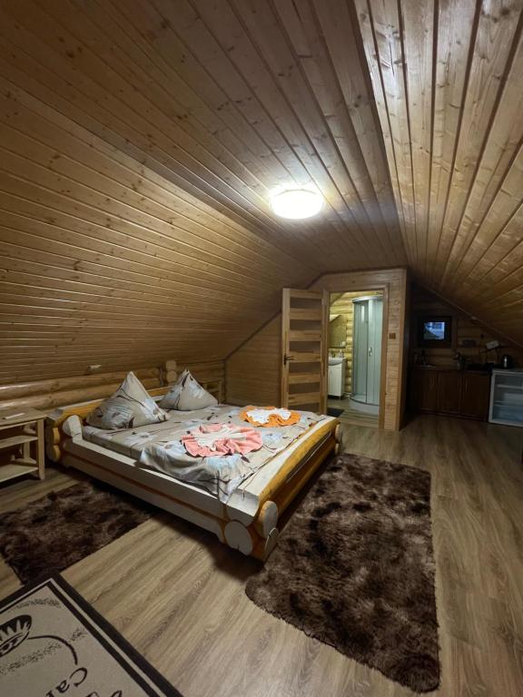 Postel nebo postele na pokoji v ubytování Cottage in Yasinya