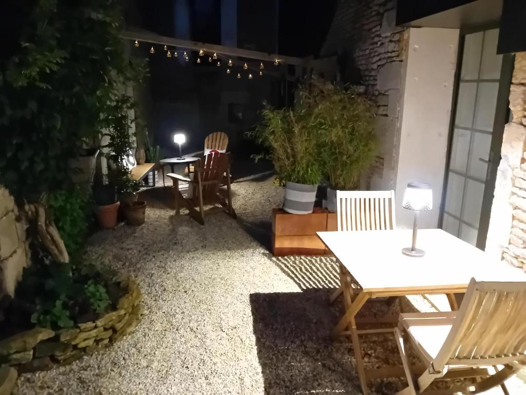 Patio nebo venkovní prostory v ubytování Le Clos de l'Aiguillon