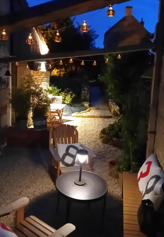 Patio nebo venkovní prostory v ubytování Le Clos de l'Aiguillon
