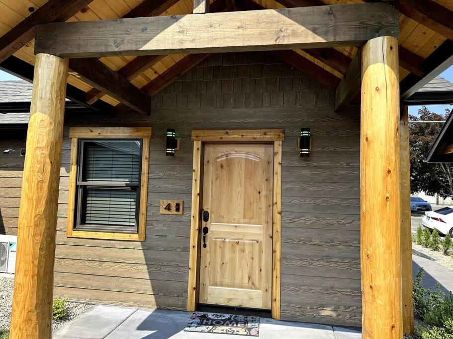 a front door of a house with a wooden door at Bear Mountain - Suite 4 in Grants Pass