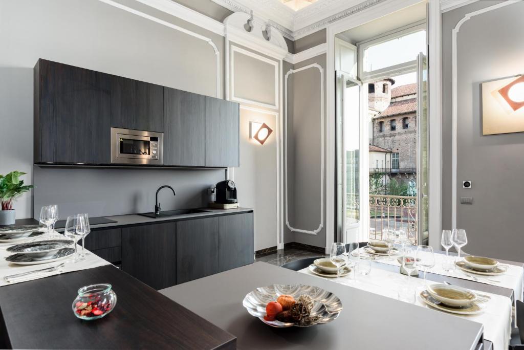 Η κουζίνα ή μικρή κουζίνα στο Q71 TIMELESS SUITES