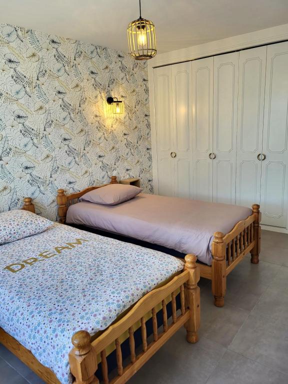 Postel nebo postele na pokoji v ubytování Gîte Cadet rousselle
