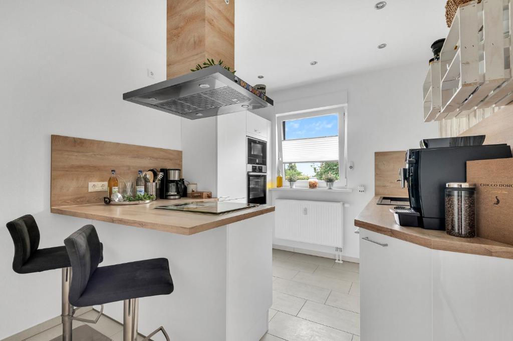 Kuchyň nebo kuchyňský kout v ubytování Ferienwohnung Blickfang am Nordberg
