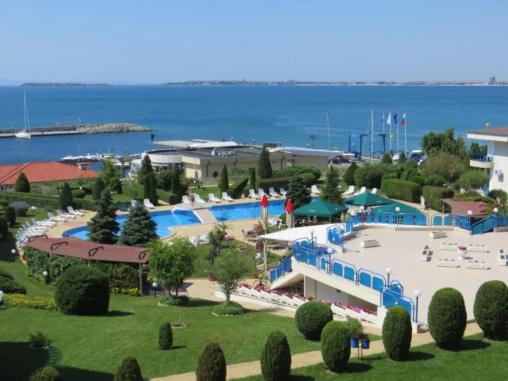 The swimming pool at or close to Holiday Apartment in Riviera Complex