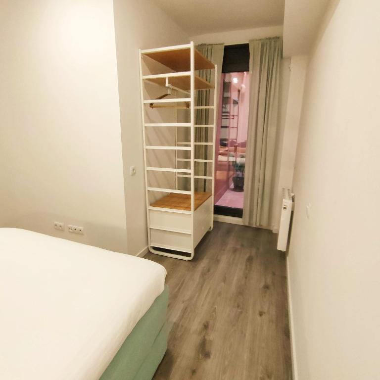 Postel nebo postele na pokoji v ubytování Mediterranean Barcelona Apartments