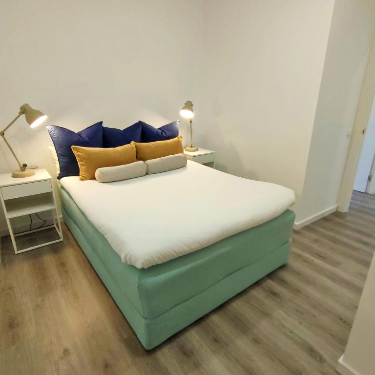 Postel nebo postele na pokoji v ubytování Mediterranean Barcelona Apartments