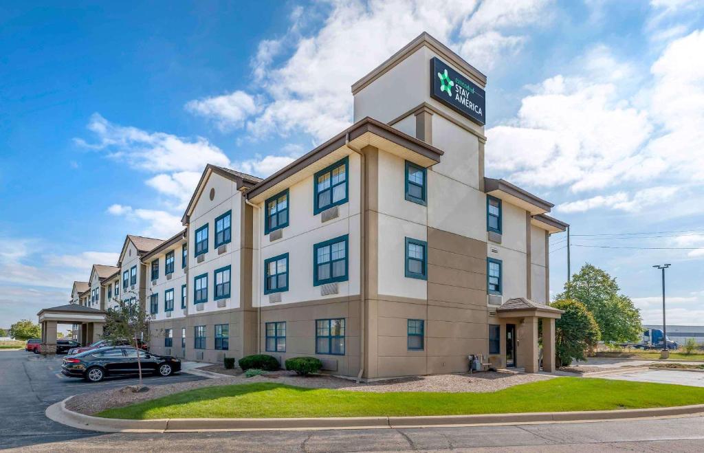 a hotel building with a sign on top of it at Extended Stay America Suites - Chicago - Romeoville - Bollingbrook in Romeoville