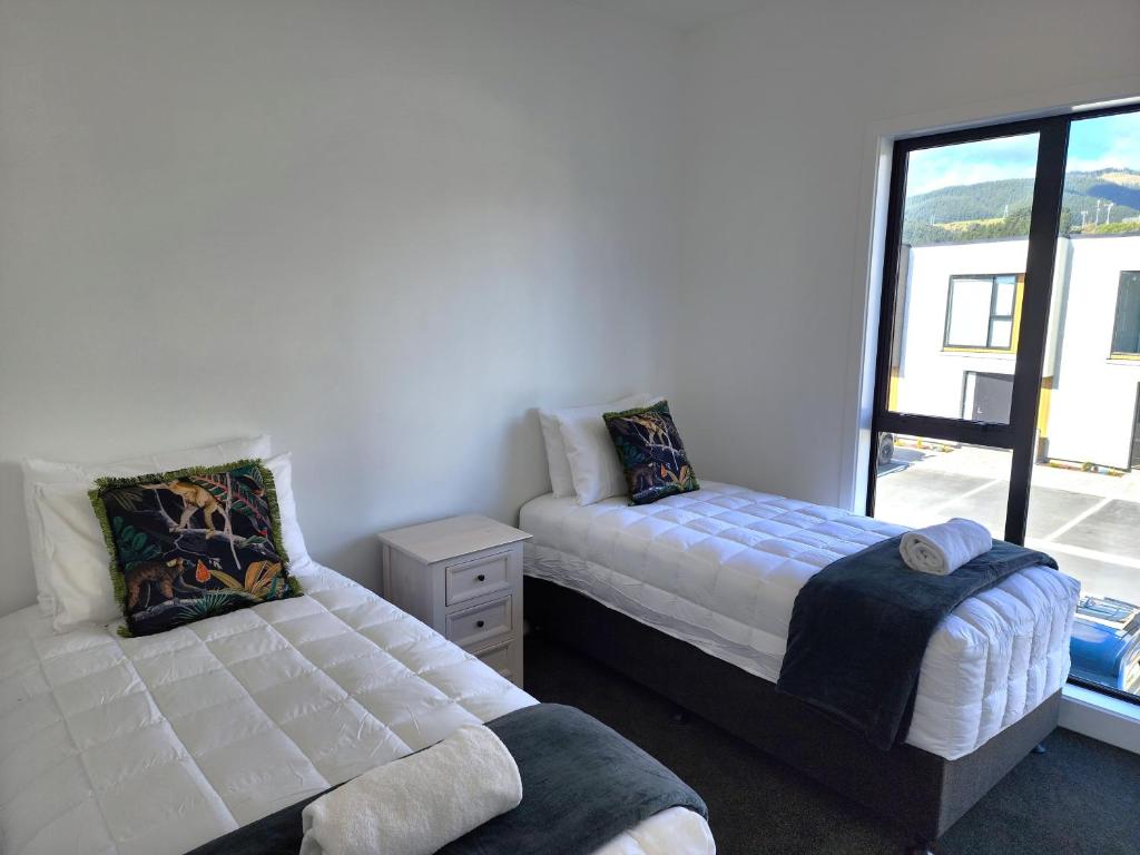 Postel nebo postele na pokoji v ubytování U Suites on Trieste Way