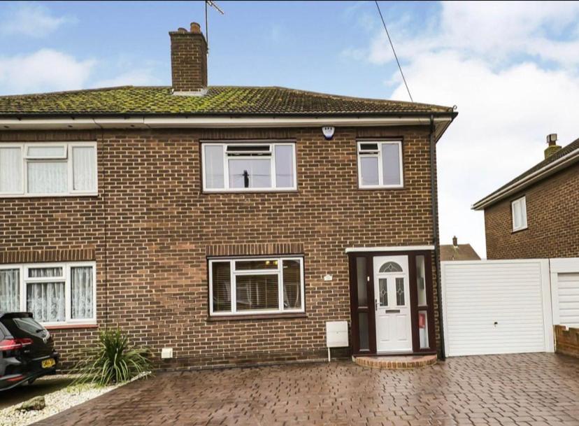 a brick house with a white door at 3 bedroom Semi detached in Erith