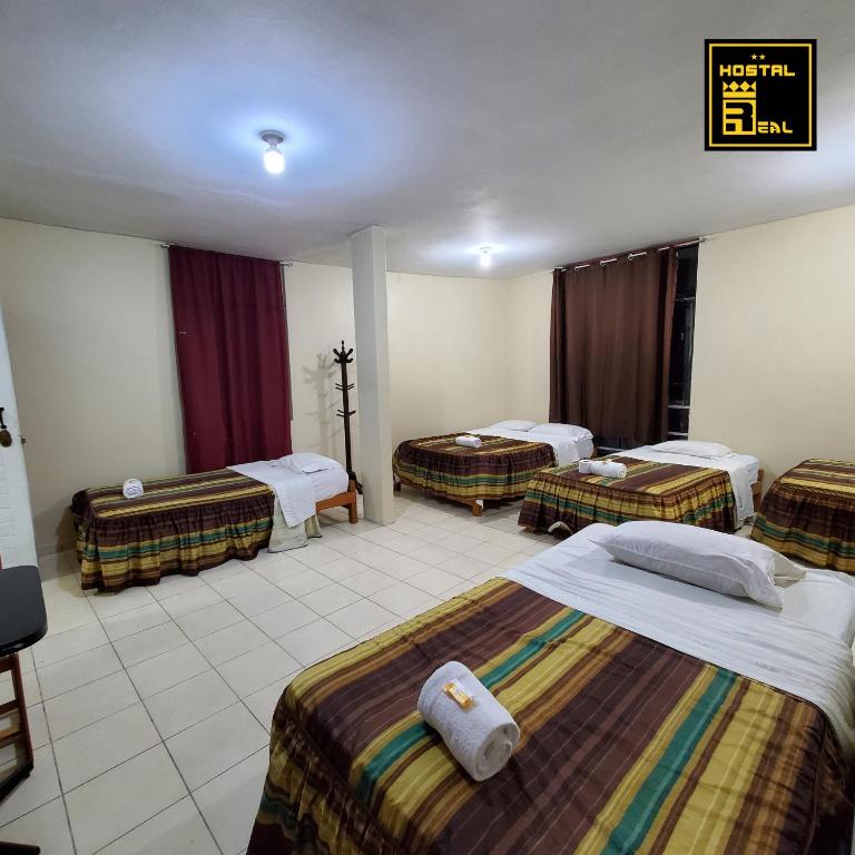 Postel nebo postele na pokoji v ubytování Hostal Real Piura - Oficial