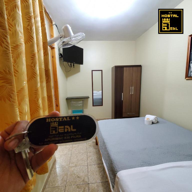 Postel nebo postele na pokoji v ubytování Hostal Real Piura - Oficial