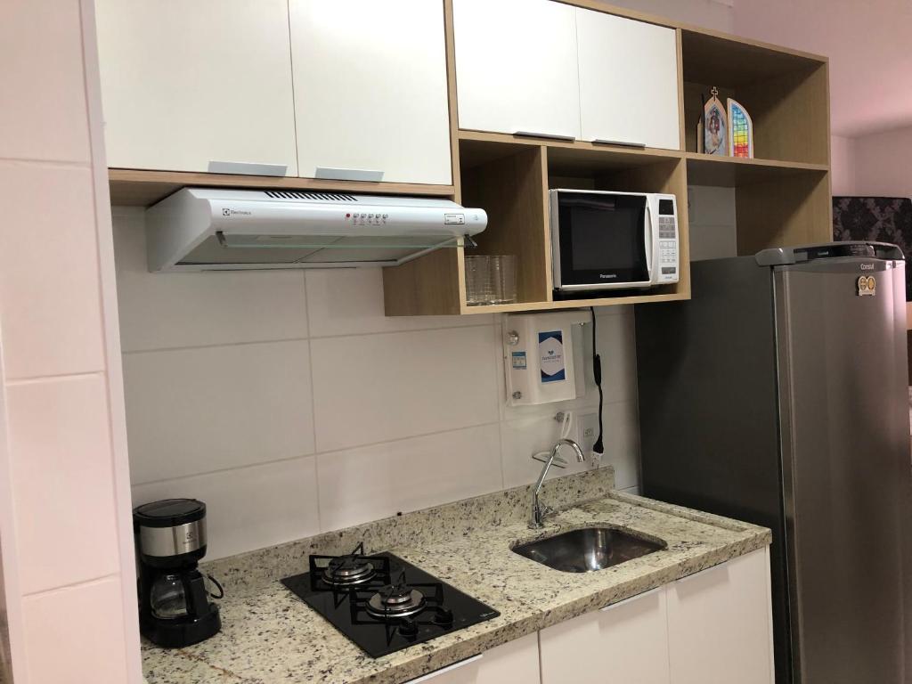 Kjøkken eller kjøkkenkrok på Studio em Cachoeira Paulista