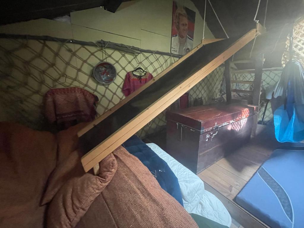 Postel nebo postele na pokoji v ubytování ゲストハウス餓鬼大将