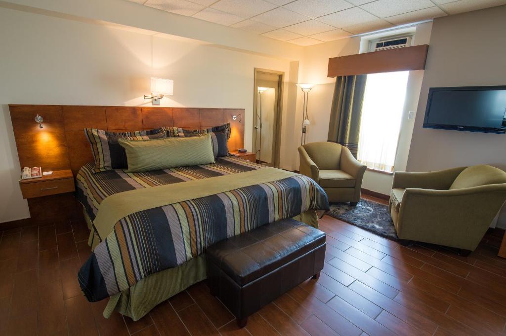 Postel nebo postele na pokoji v ubytování Hotel du Fjord