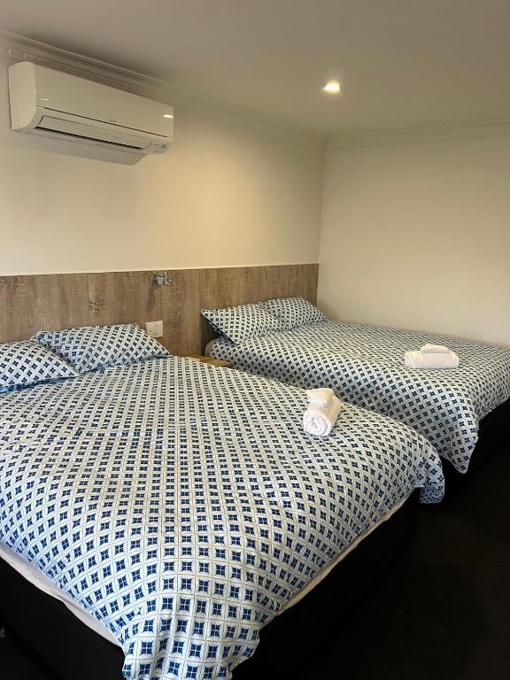 Postel nebo postele na pokoji v ubytování Holiday Room in Chartwell