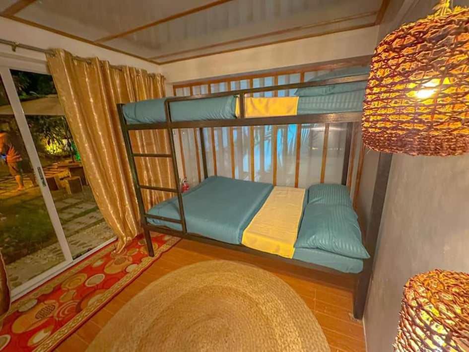 Postel nebo postele na pokoji v ubytování Remy's Nest