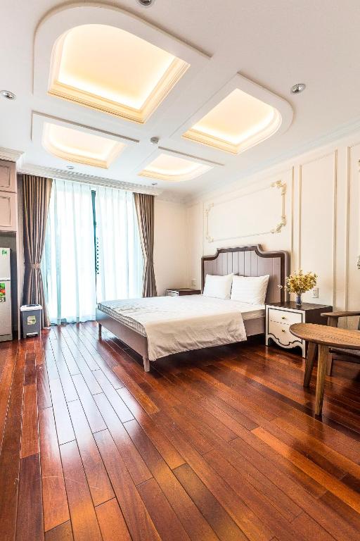 Postel nebo postele na pokoji v ubytování Ngan Ha 2 Apartment