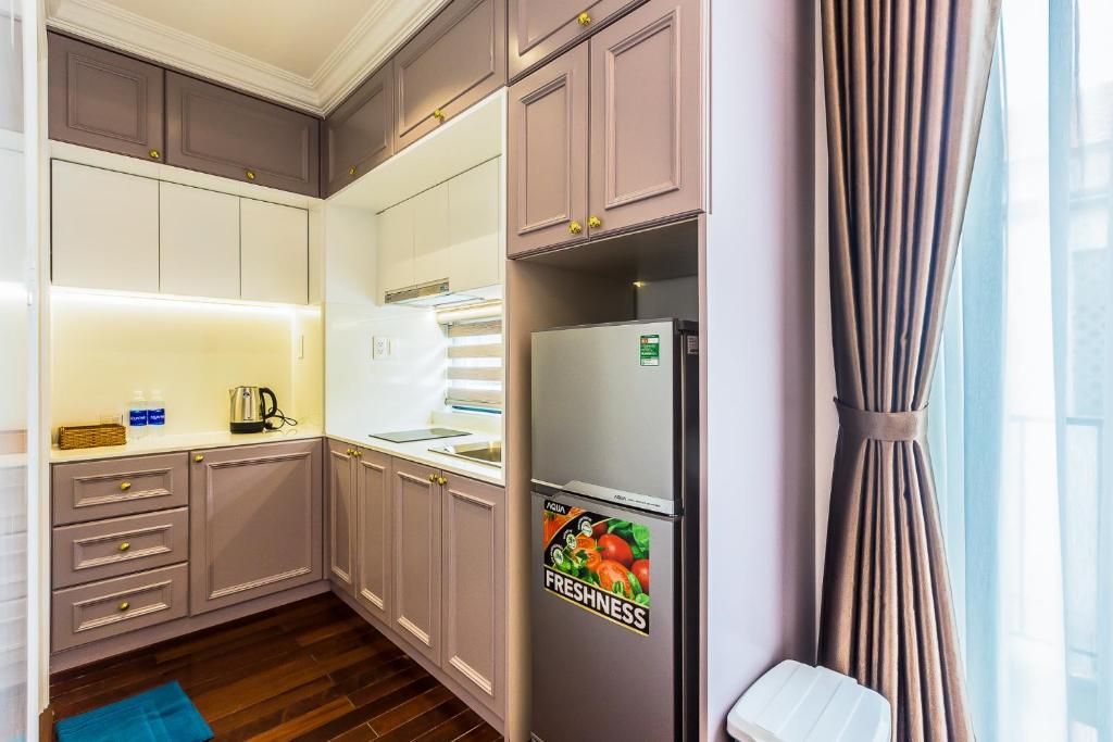 Kuchyň nebo kuchyňský kout v ubytování Ngan Ha 2 Apartment