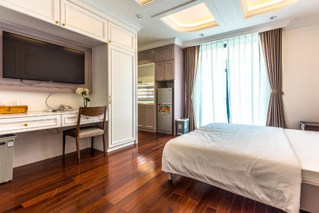 Kuchyň nebo kuchyňský kout v ubytování Ngan Ha 2 Apartment