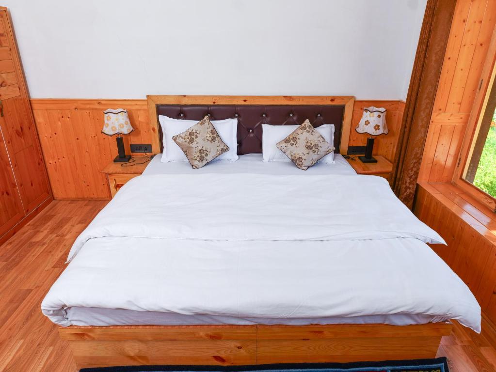 Postel nebo postele na pokoji v ubytování De Khama