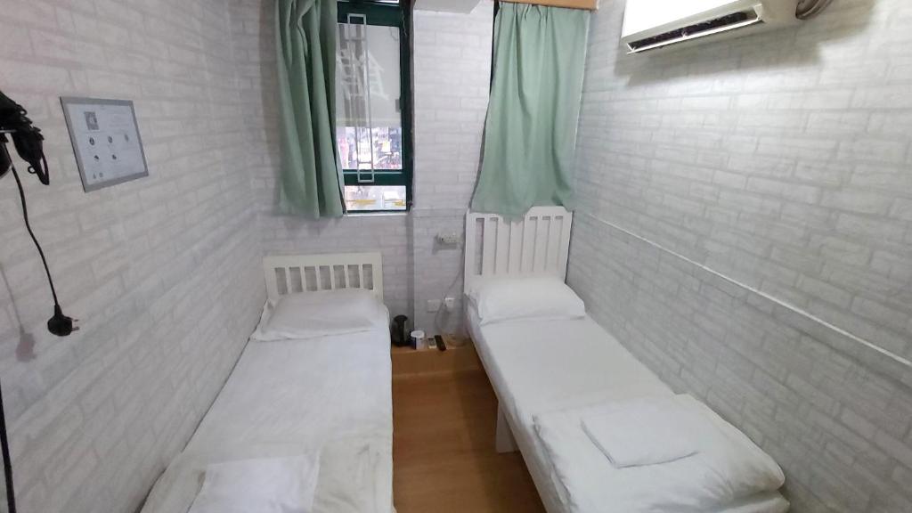 Postel nebo postele na pokoji v ubytování Cozy Inn Jordan Station