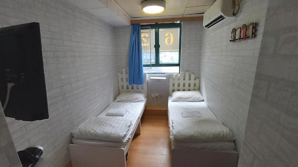 Postel nebo postele na pokoji v ubytování Cozy Inn Jordan Station