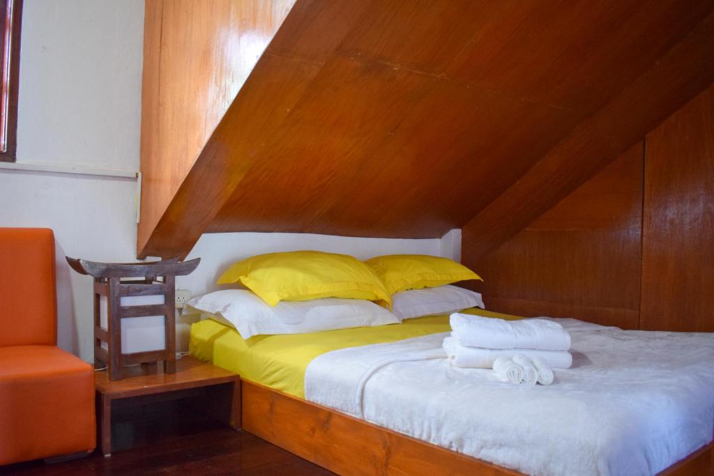 Postel nebo postele na pokoji v ubytování Orokasa Guesthouse