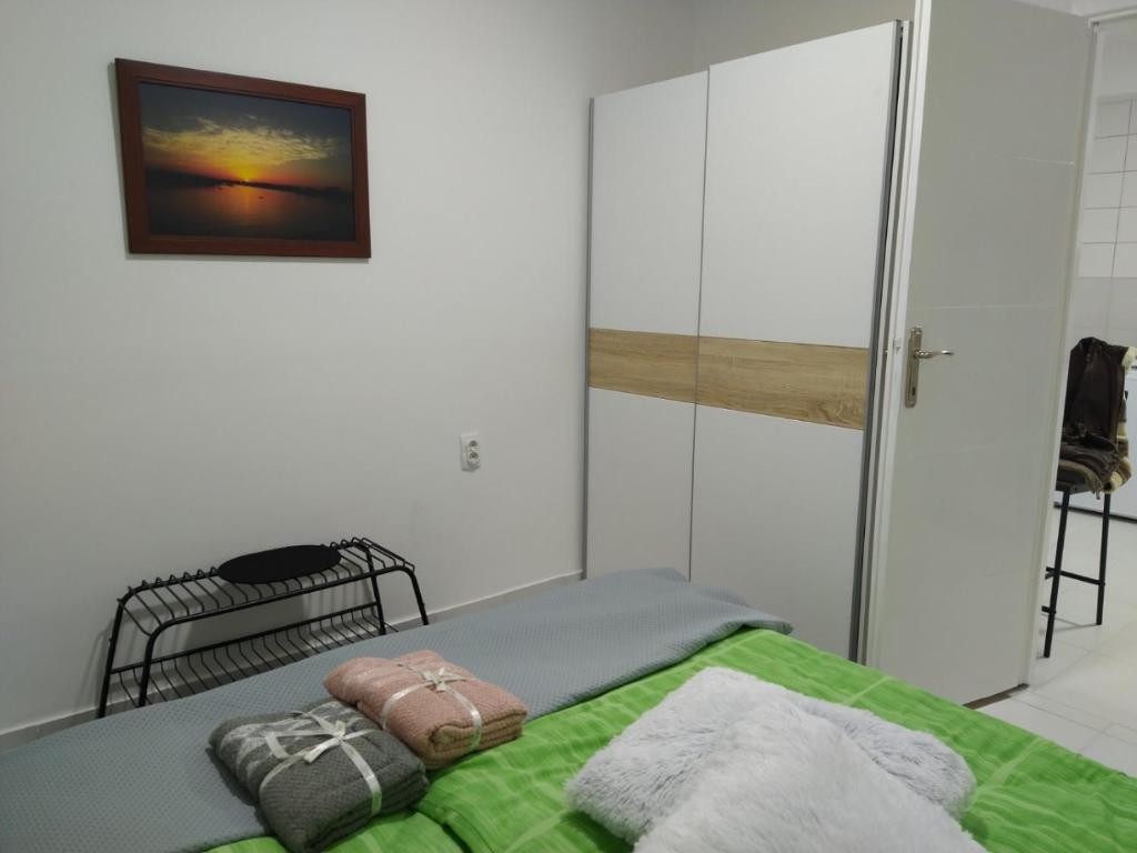 Postel nebo postele na pokoji v ubytování Apartman Katy
