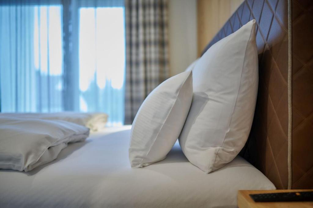Postel nebo postele na pokoji v ubytování Hotel Der Einrichter