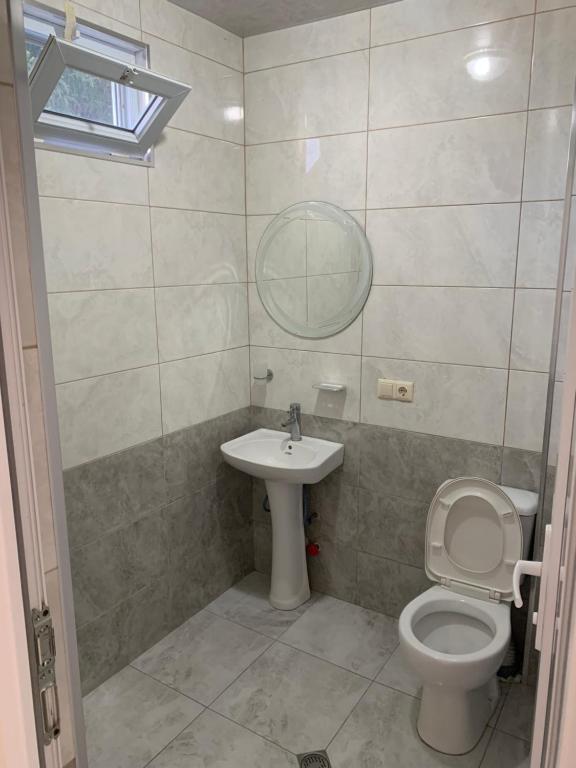 Koupelna v ubytování KARD HOUSE