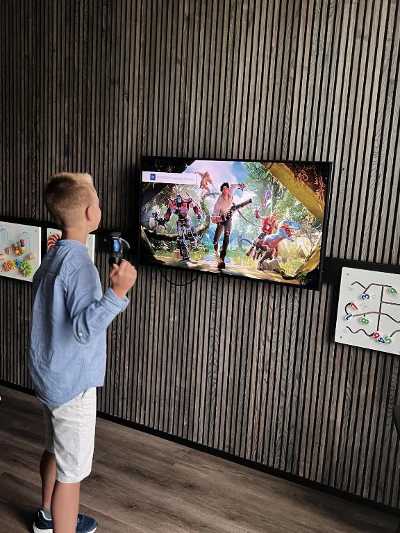 Kinder, die in der Unterkunft Mana Sleep &amp; Spa übernachten