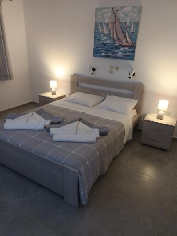 Postel nebo postele na pokoji v ubytování Holidays in Paros