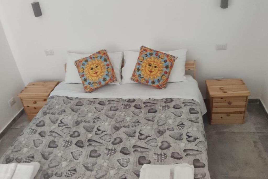 Postel nebo postele na pokoji v ubytování Villa in campagna vicina al mare Bonerelax