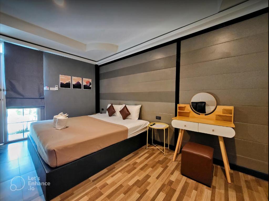 Кровать или кровати в номере ViphuananResort