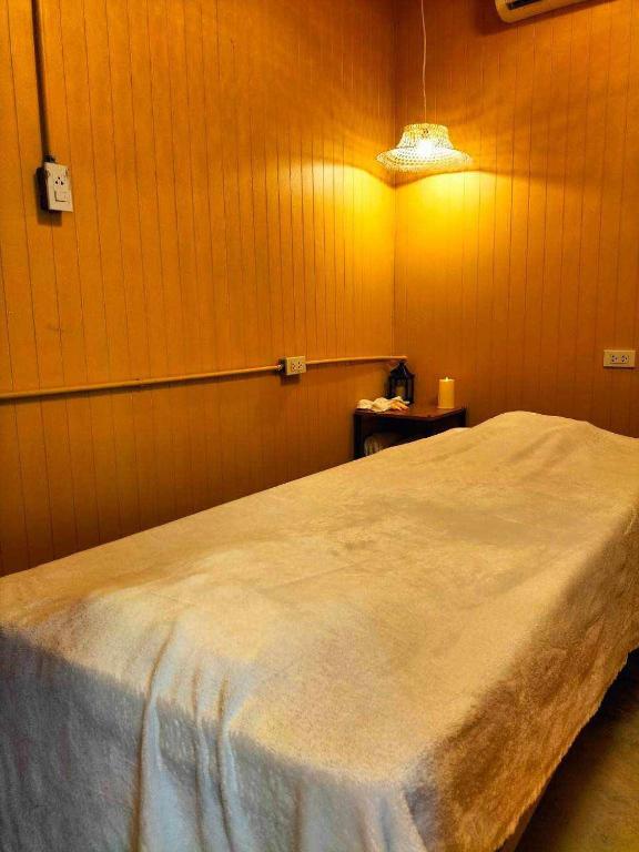 Postel nebo postele na pokoji v ubytování ViphuananResort