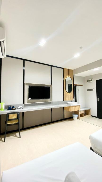 Postel nebo postele na pokoji v ubytování C Hotel